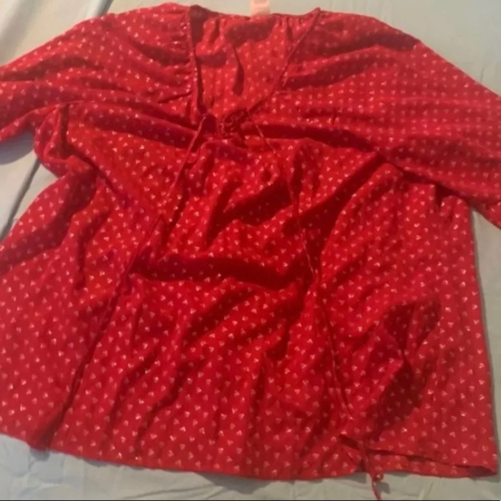 Red long sleeve shirt with hearts on it